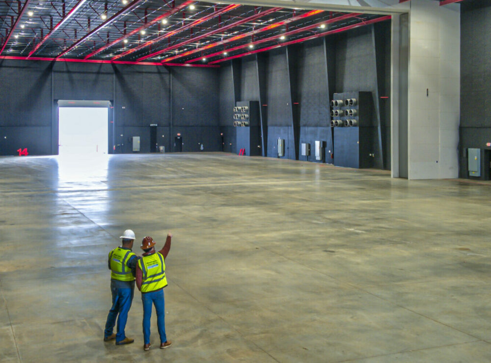 Construction workers inside EUE Screen Gems stages 14 and 15